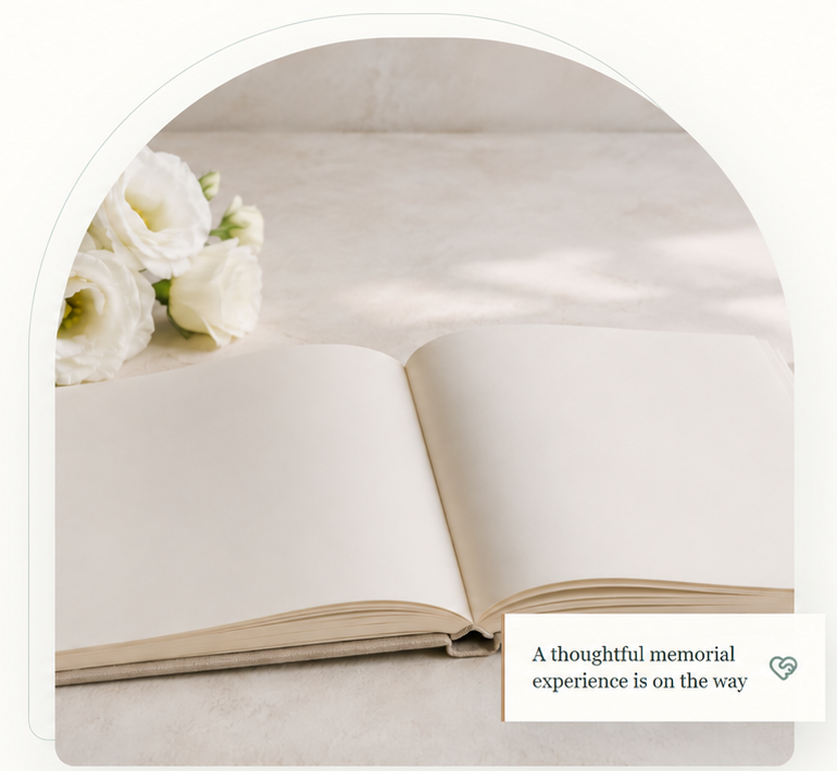 An open memorial book beside white flowers with the message: A thoughtful memorial experience is on the way